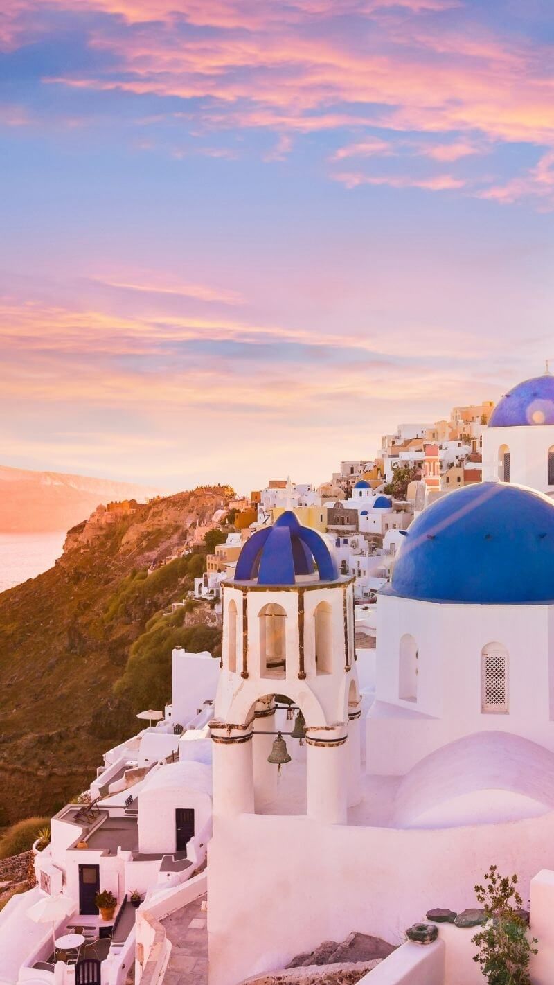 A beautiful white building with blue domes - Travel