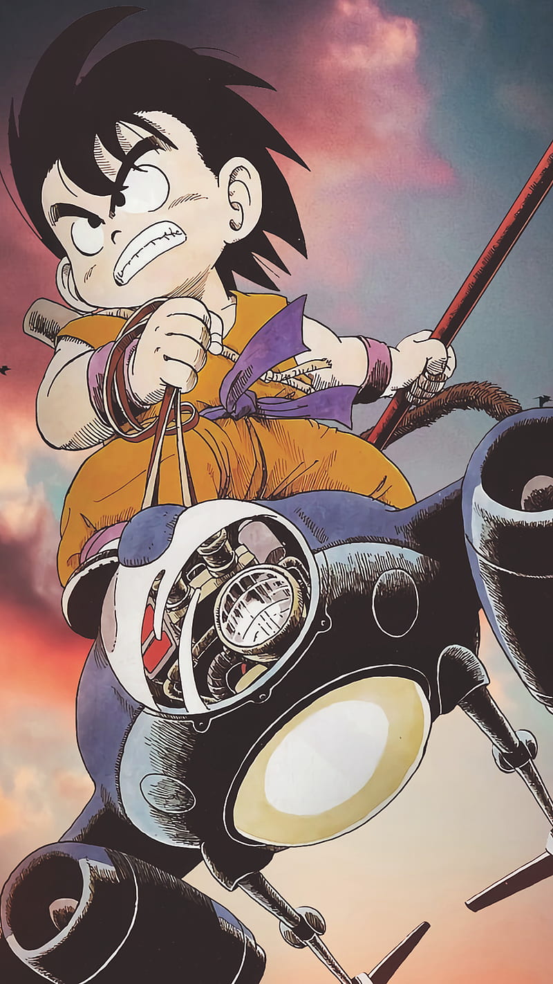 A young Gohan rides a motorcycle in the sky, his hair flying in the wind. - Goku