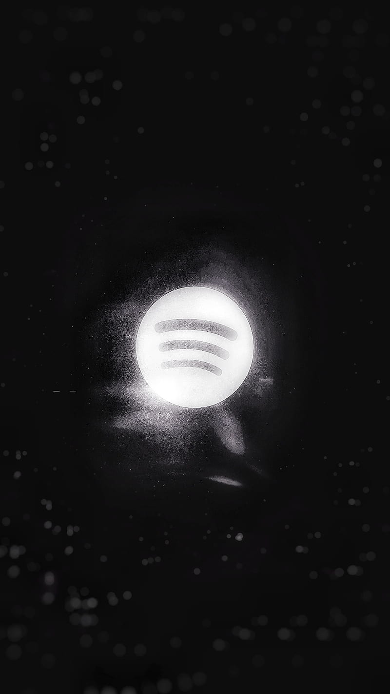 A black and white image of an apple - Spotify