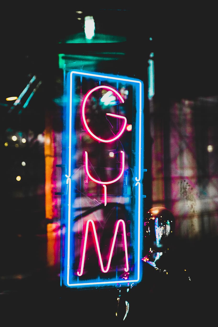 A neon sign that says gym - Gymnastics, gym