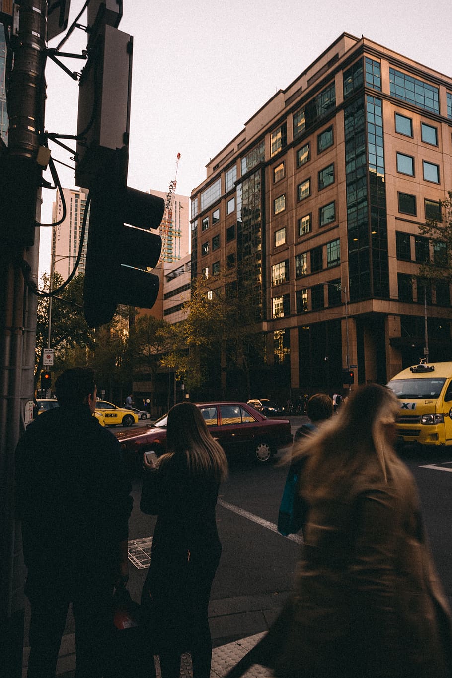 A group of people walking down the street - Photography, blurry
