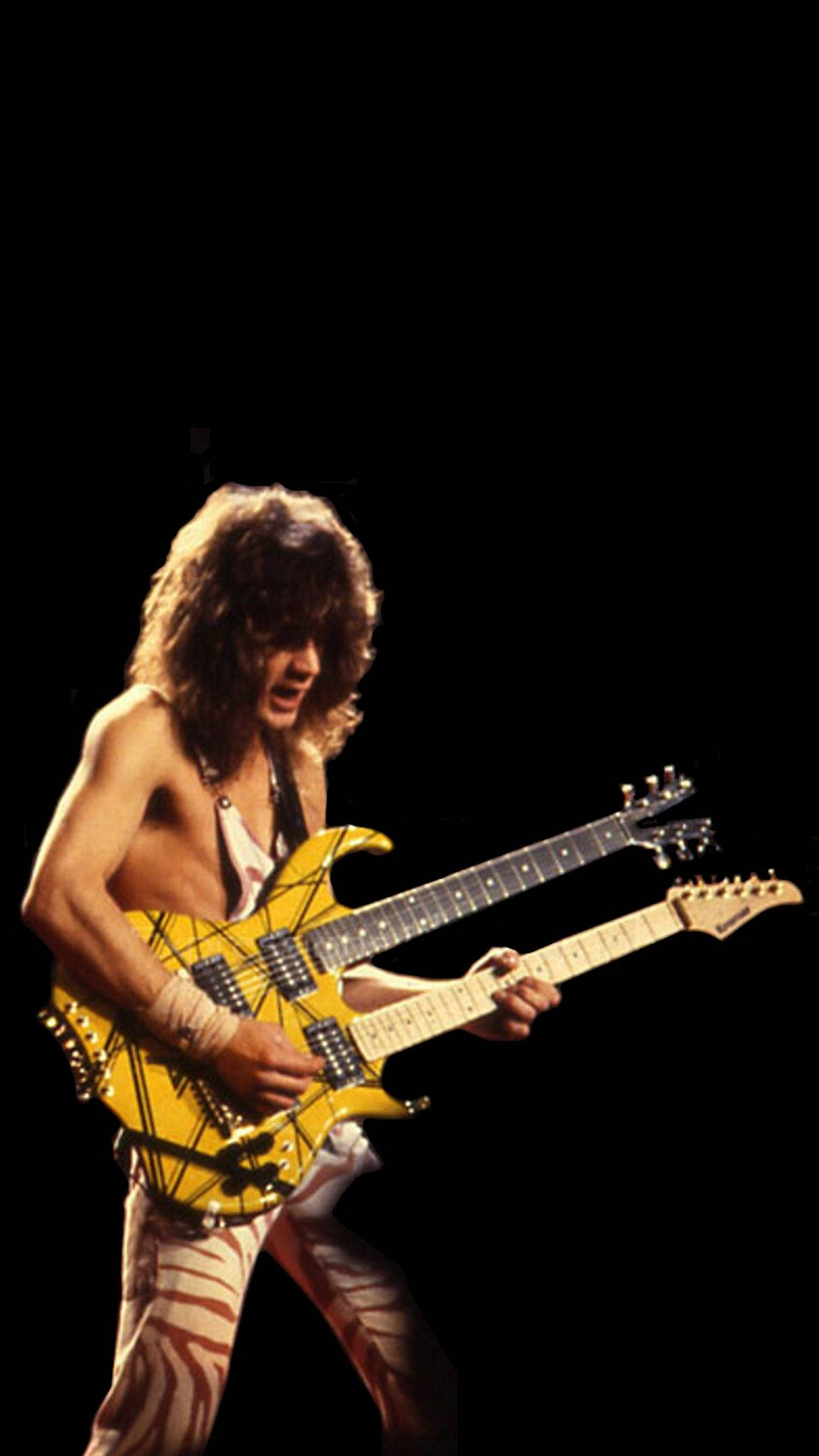 Eddie Van Halen playing his guitar in the 80s - Rock