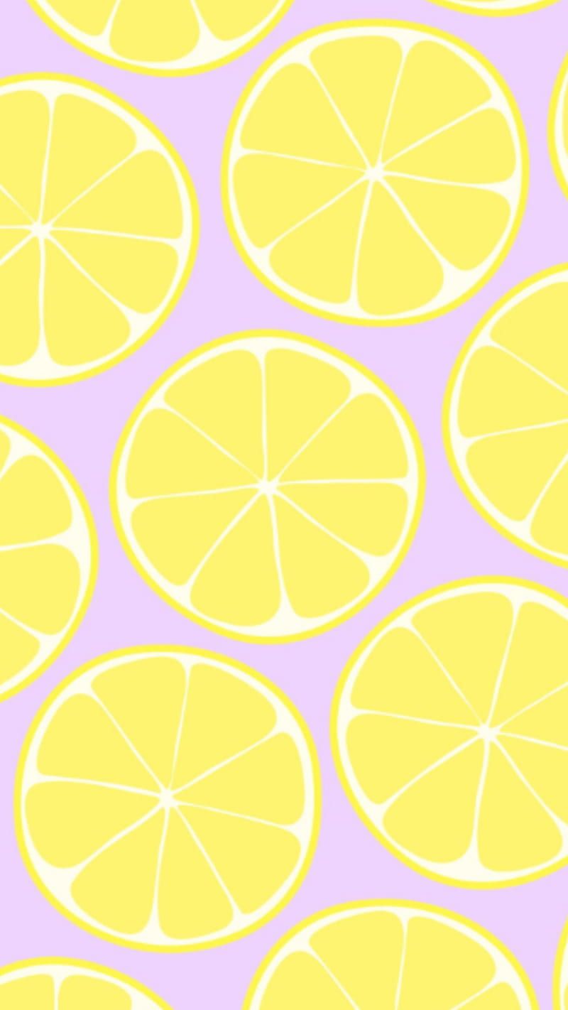 Lemon slices on a purple background - Lemon