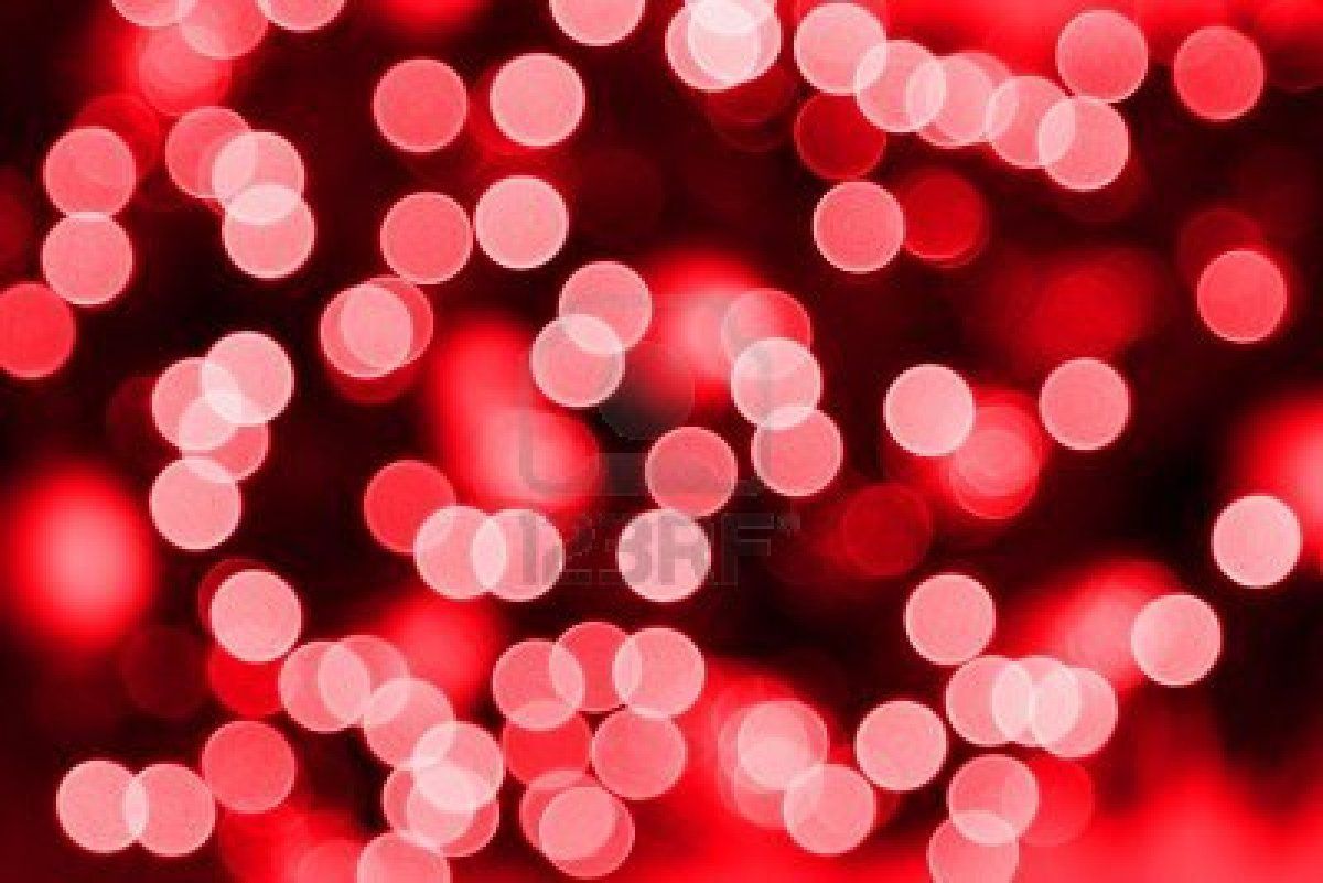 Red Bokeh lights on a black background - Christmas lights
