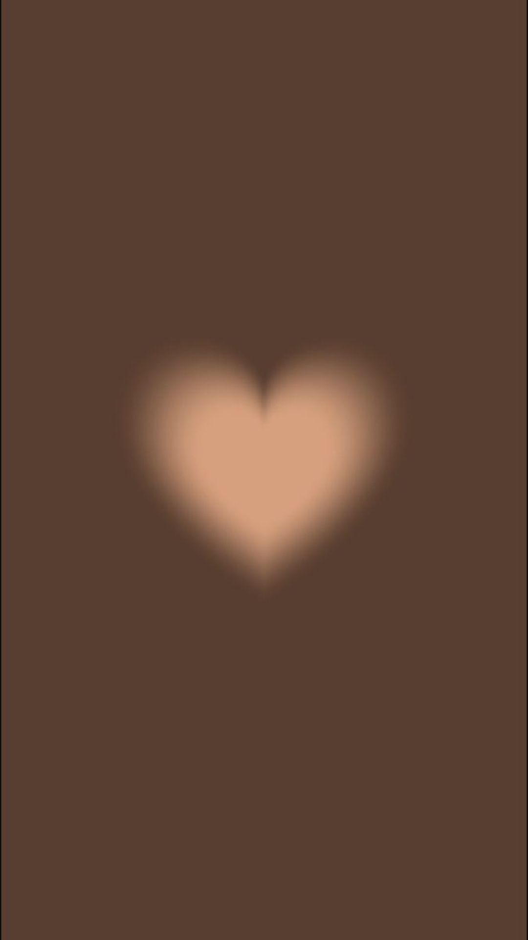 A heart shape in the middle of a brown background - Heart
