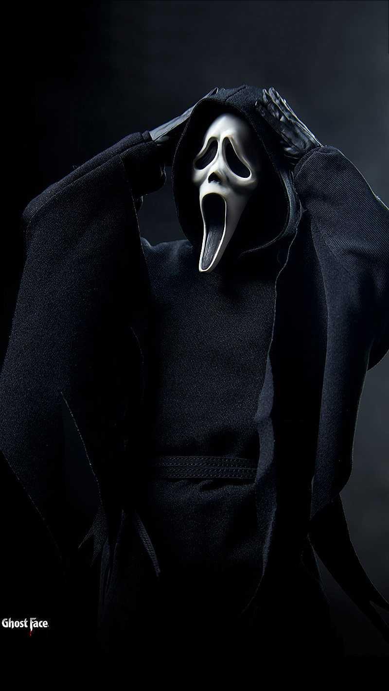 Ghost Face from the Scream movie franchise, wearing a black hooded sweatshirt and holding a knife to his own neck. - Ghostface