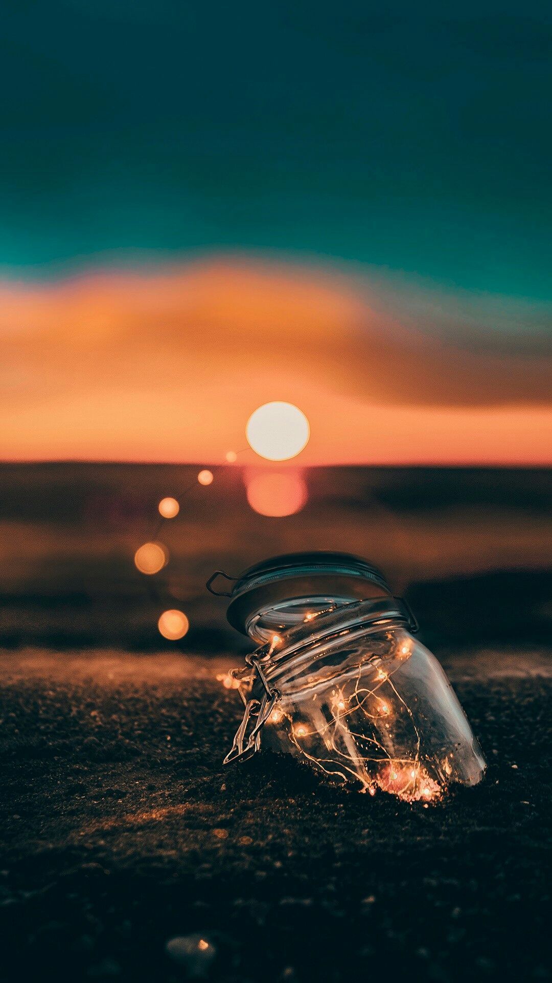 A glass jar filled with fairy lights on the beach - Beautiful, sunset, photography, HD
