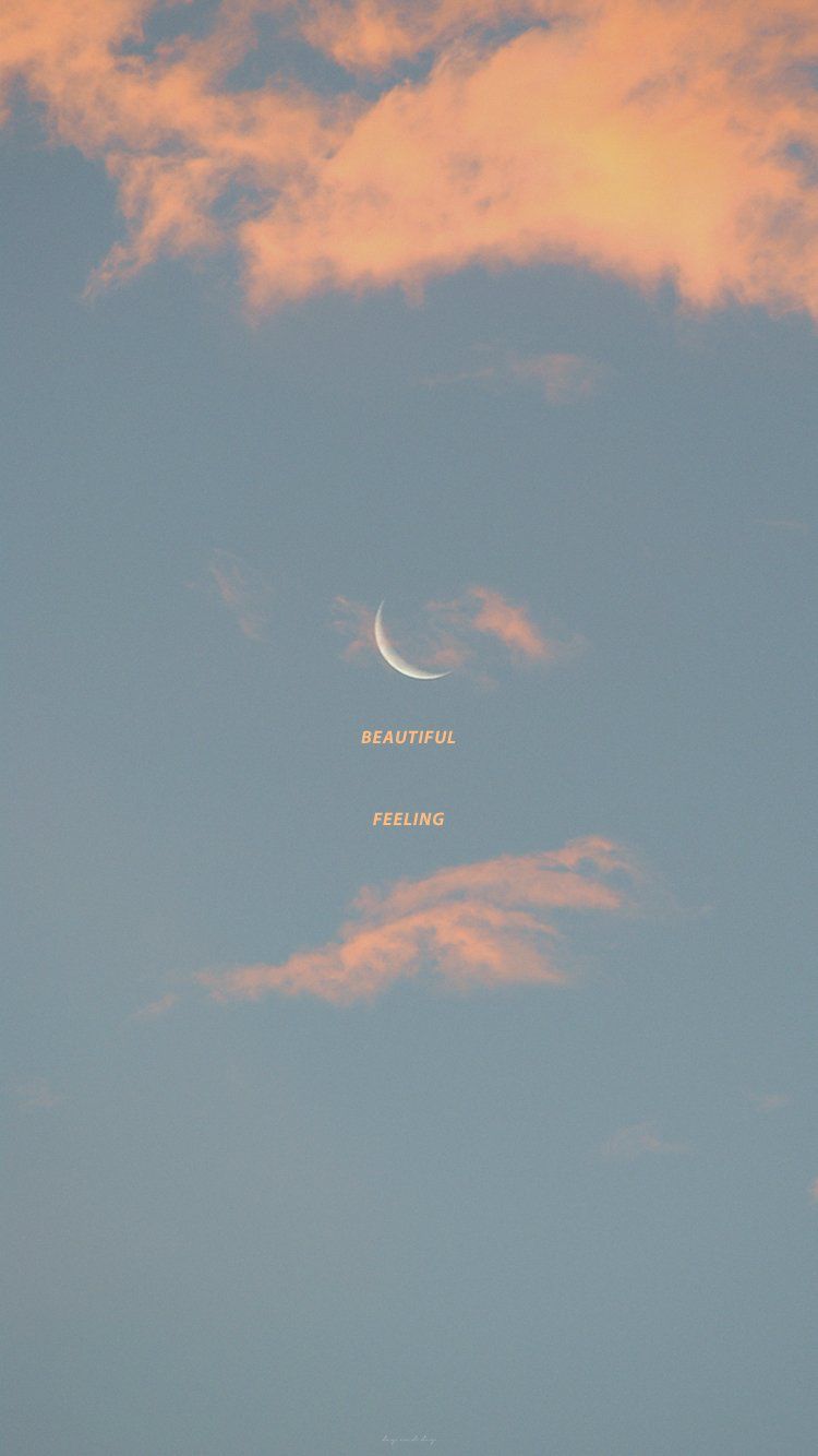 Aesthetic phone wallpaper of a crescent moon in a blue sky with pink clouds - Beautiful