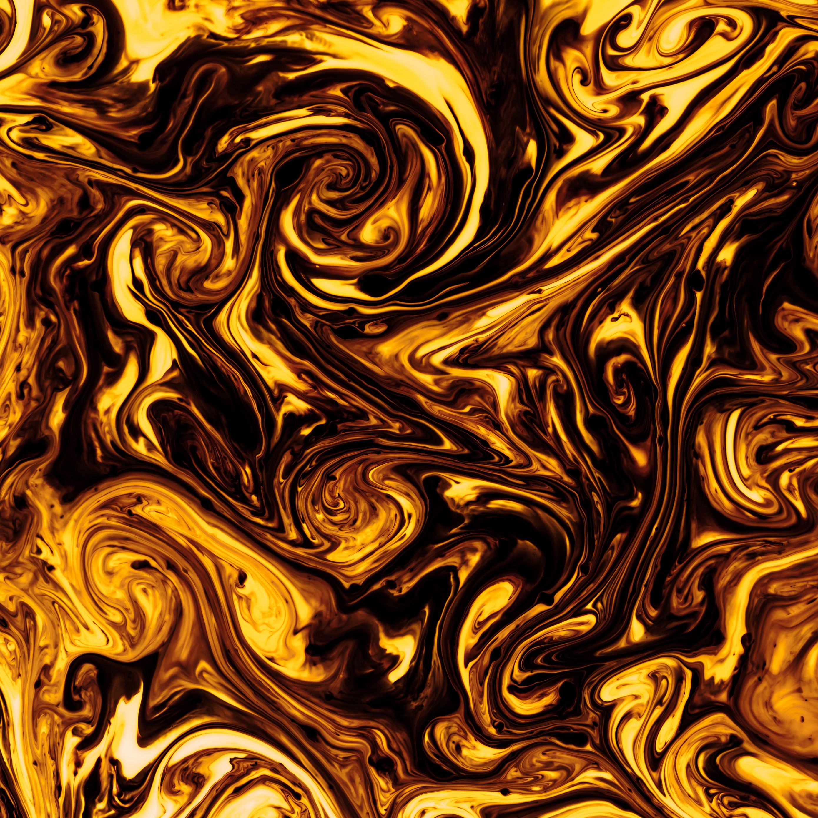 A close up of an abstract pattern in gold and black - Gold