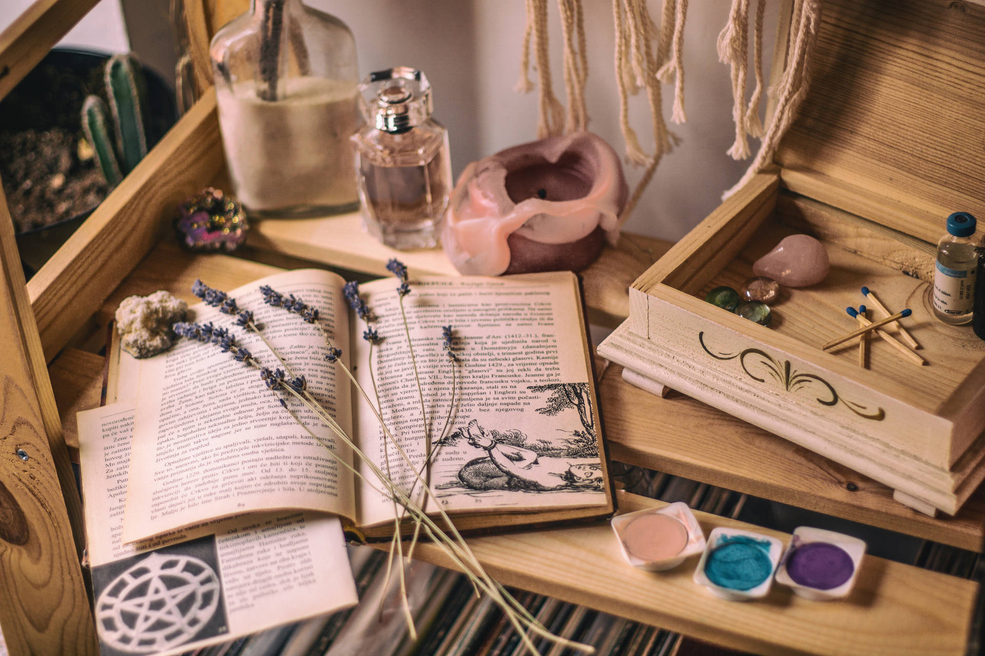 A table with books, candles and other items - Books