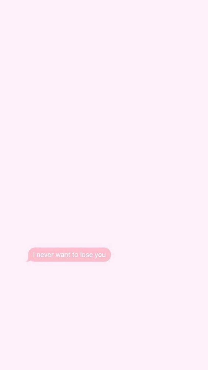 A pink phone background with a text bubble that says 