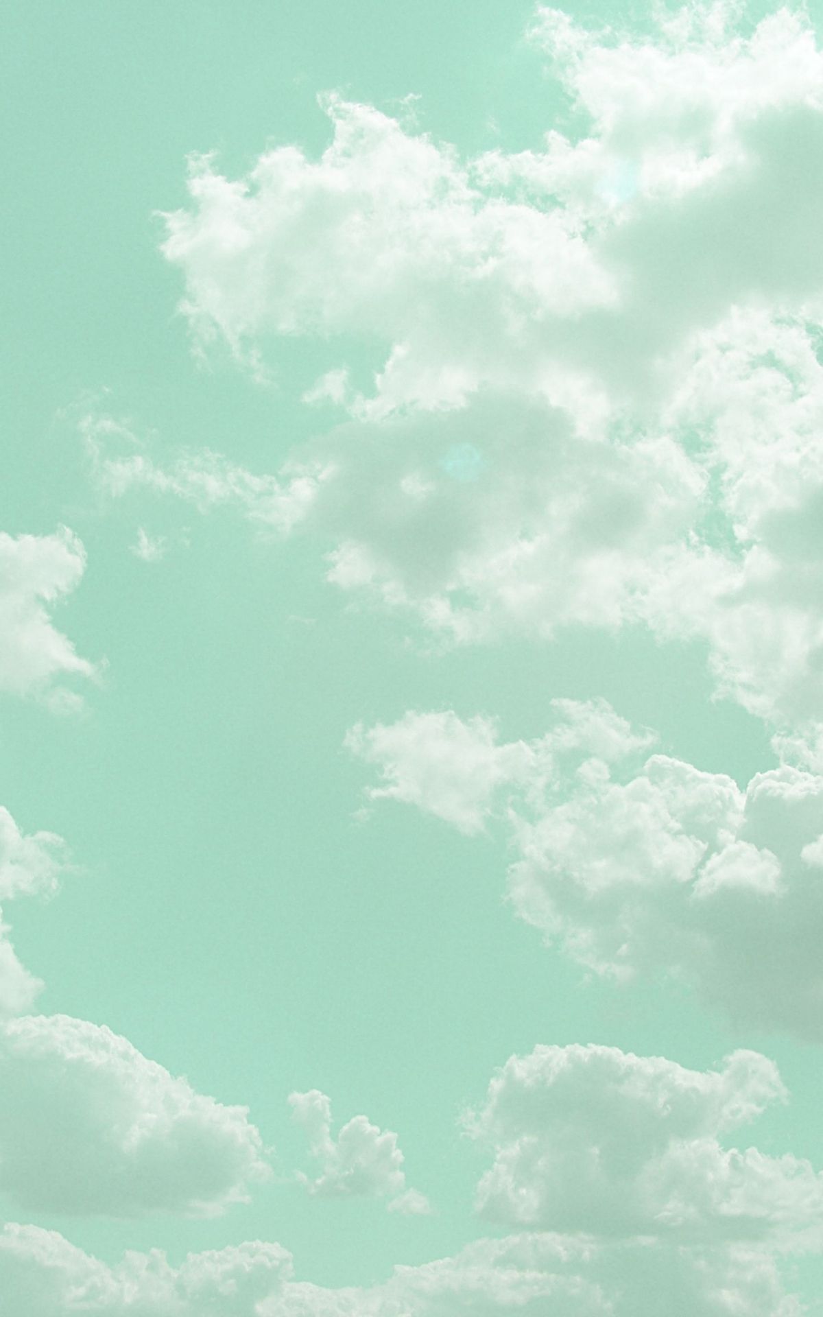 A light blue sky with white clouds - Mint green, pastel green, cloud