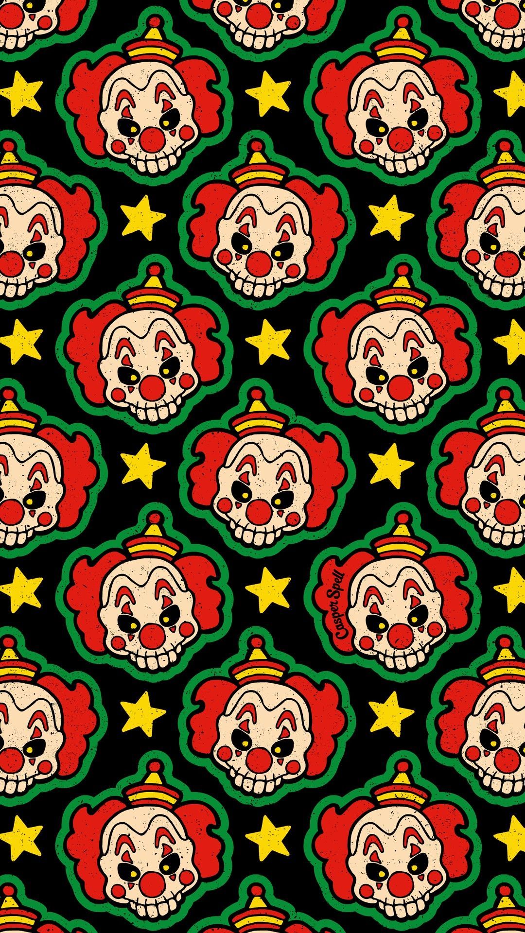 A pattern of clown skulls with red hair and yellow stars on a black background - Clown