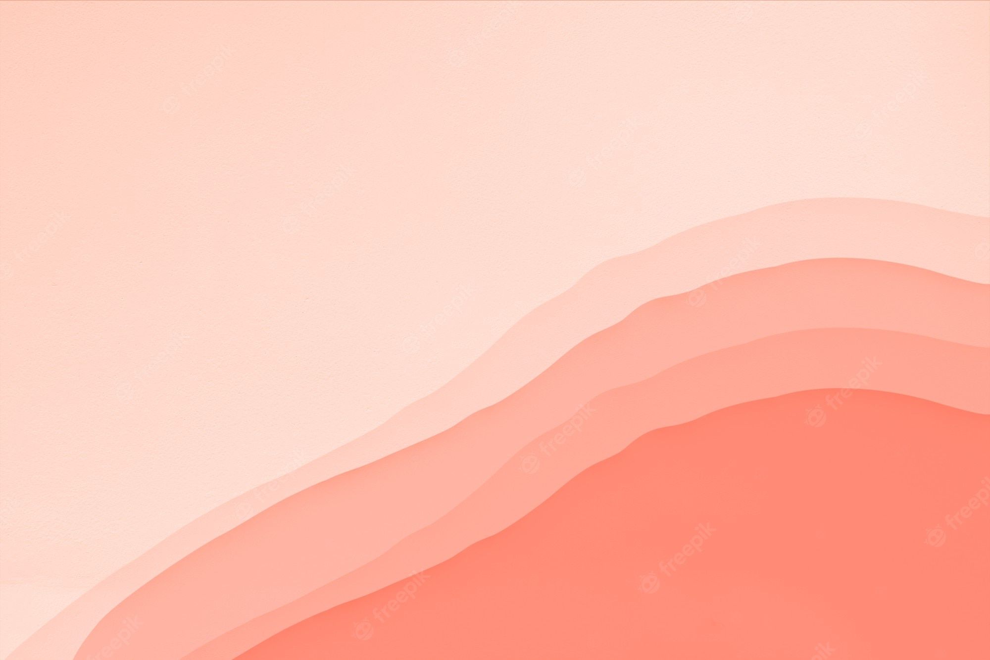 A graphic with a gradient of pink and orange with a texture of sand dunes - Coral