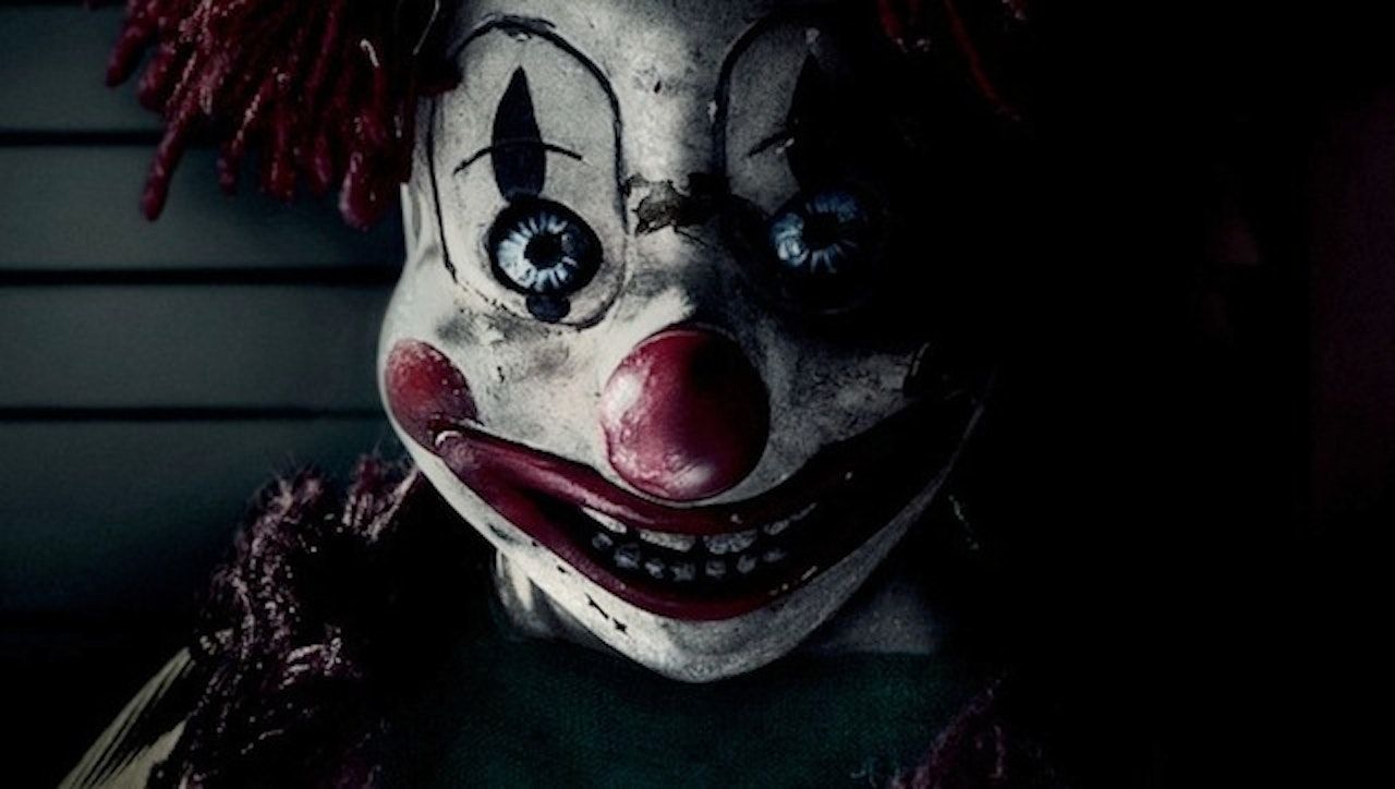 A creepy clown from the 2015 film, 'The Clown.' - Clown, horror