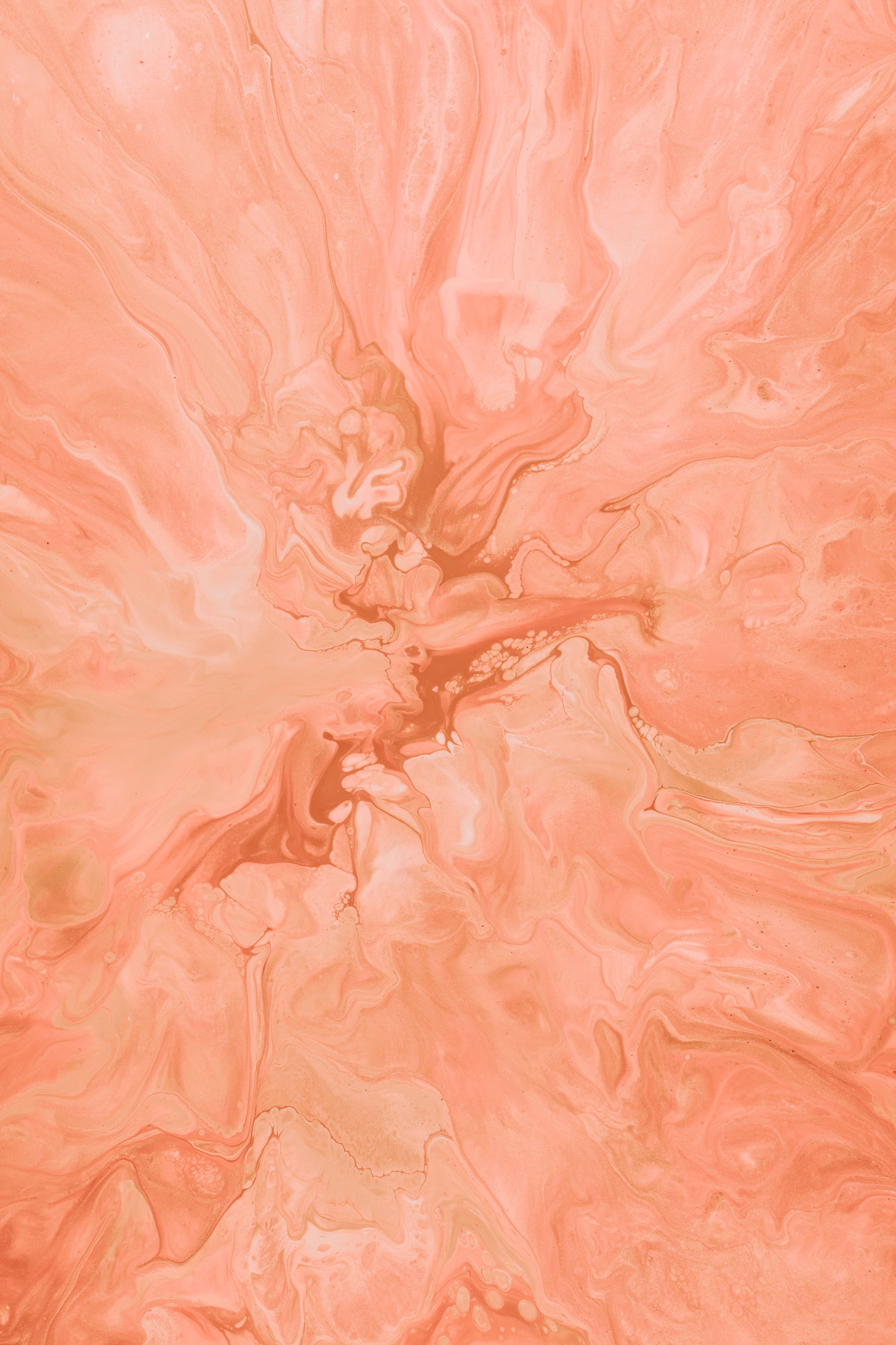 A close up of an orange and pink abstract painting - Orange, coral, pastel orange