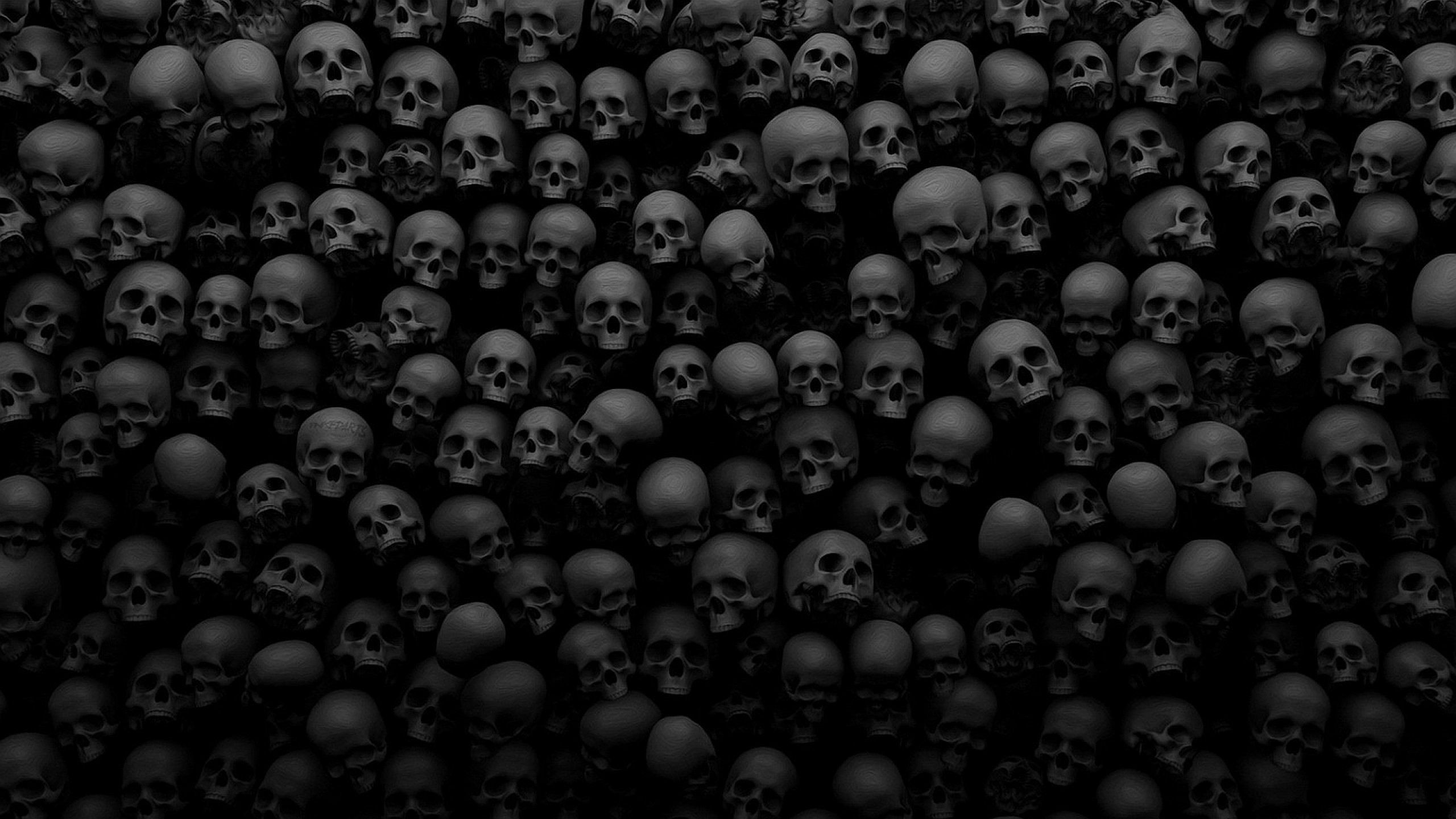 A black and white image of skulls - Creepy, horror