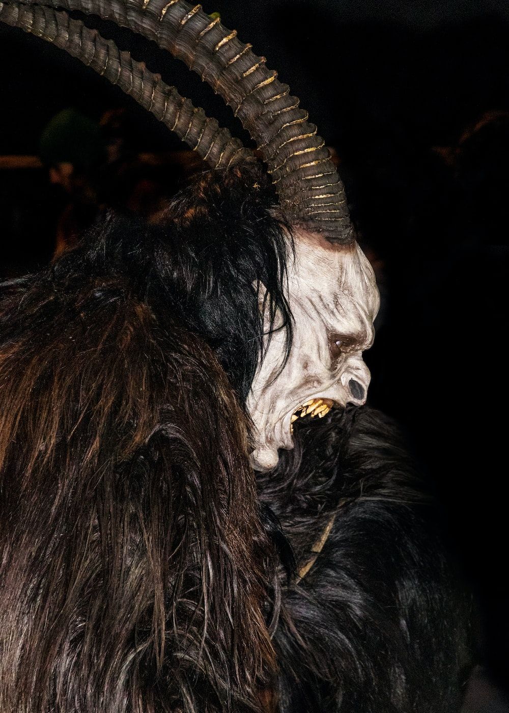 A man with horns and fur on his face - Creepy, horror