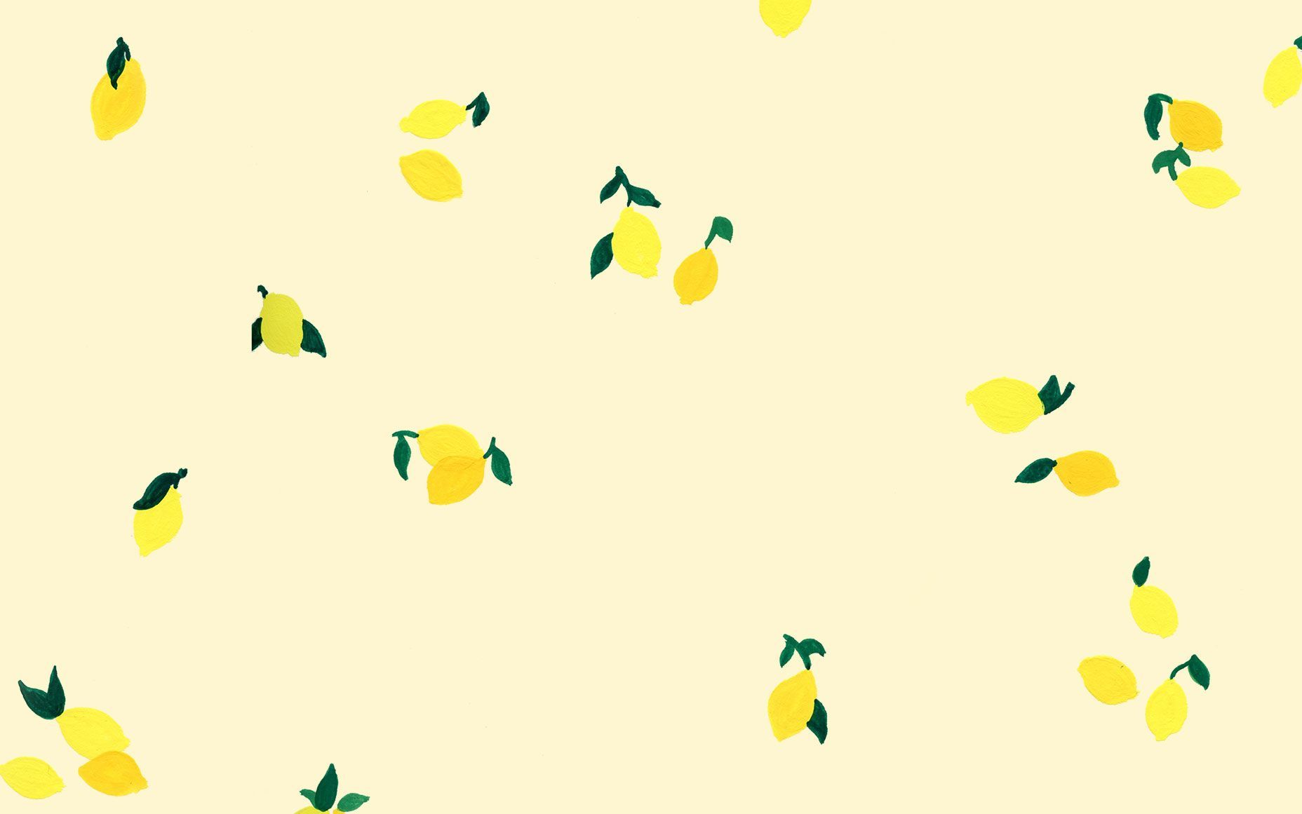 A pattern of lemons and leaves on a pale yellow background - Lemon