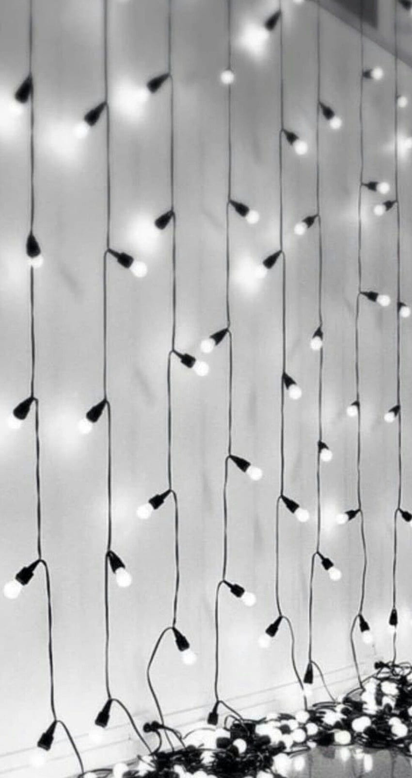 Black and white lights hanging from the ceiling - Silver