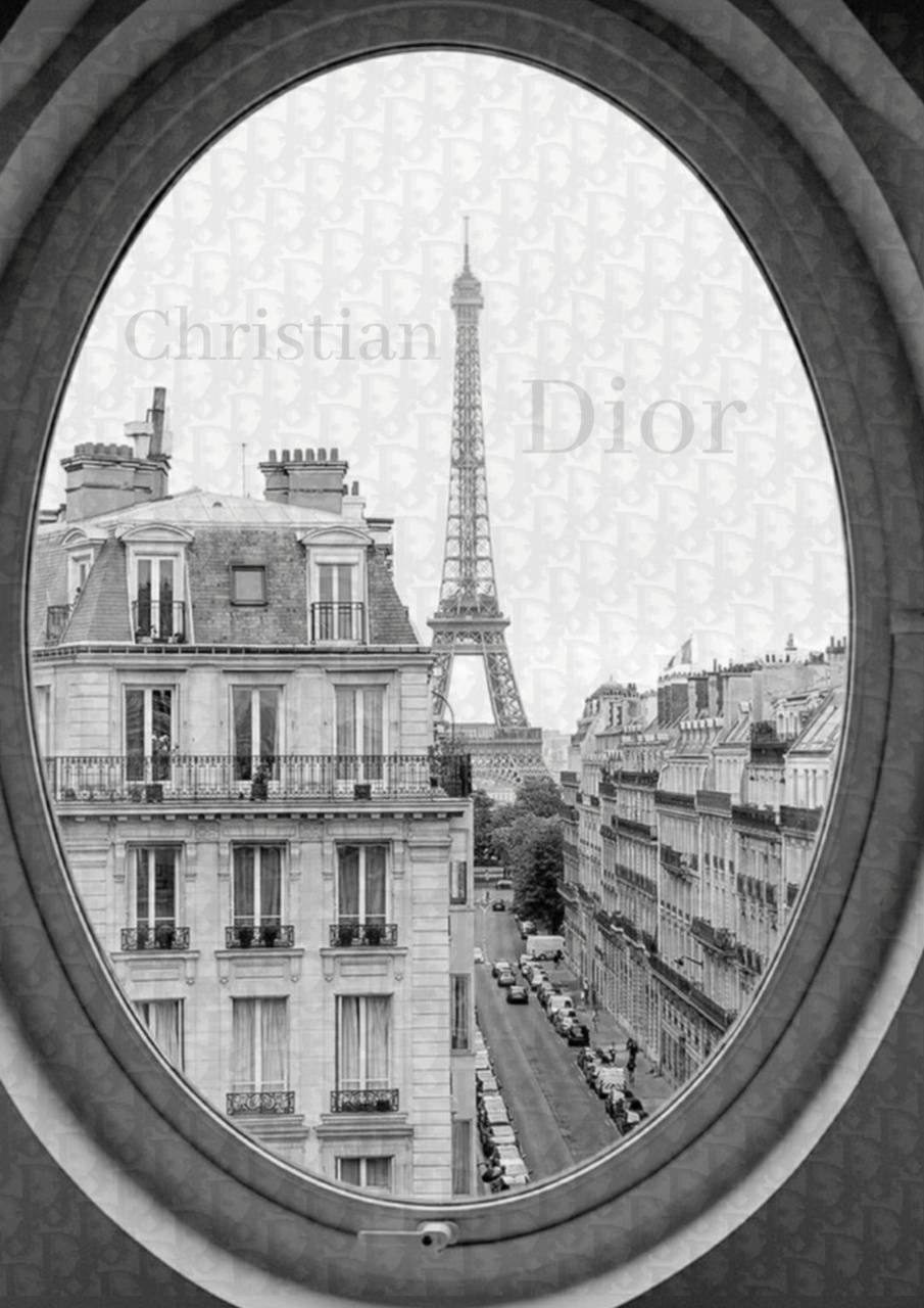 Black and white photograph of a view of the Eiffel Tower from a Paris window - Dior