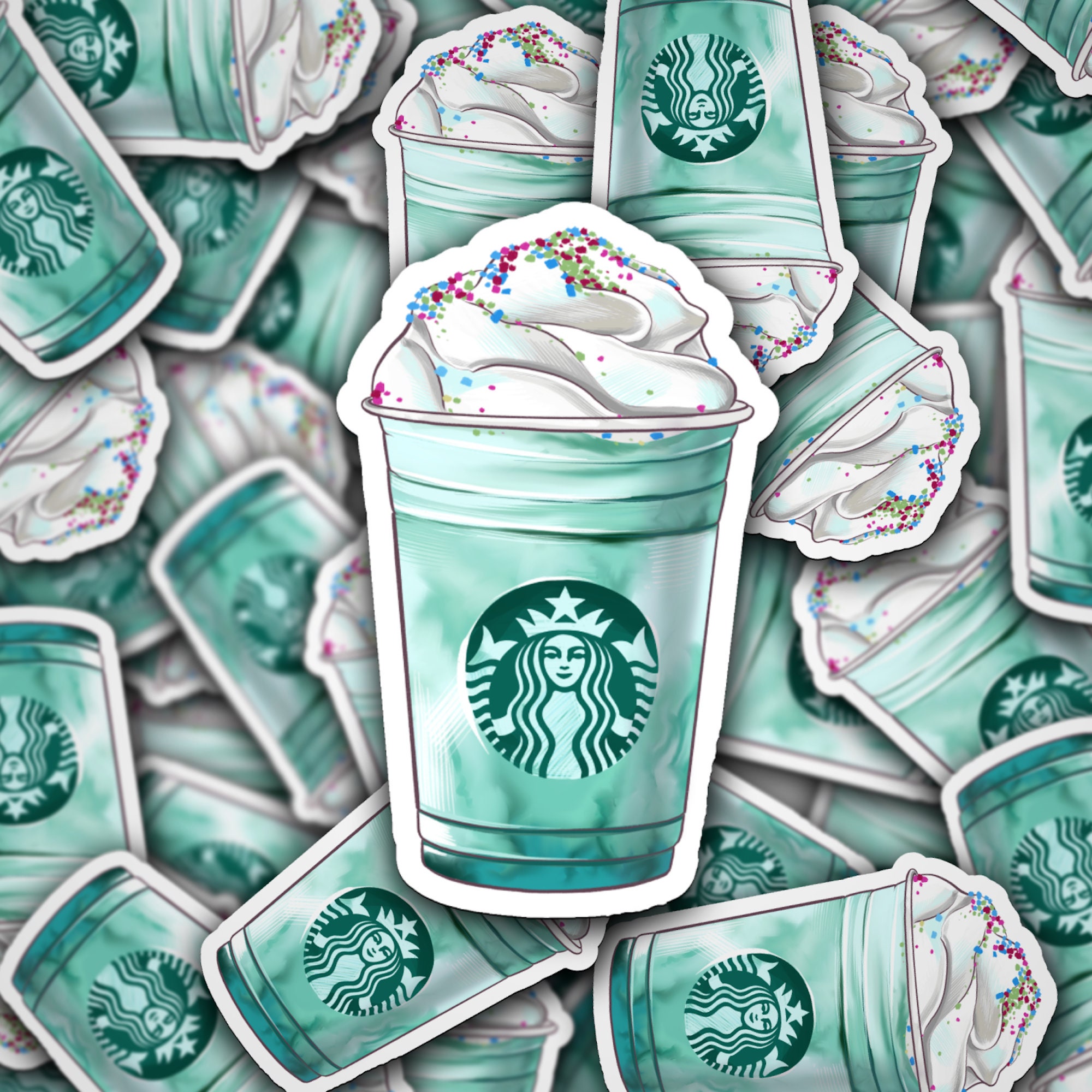 A sticker of a Starbucks drink with sprinkles on top - Starbucks