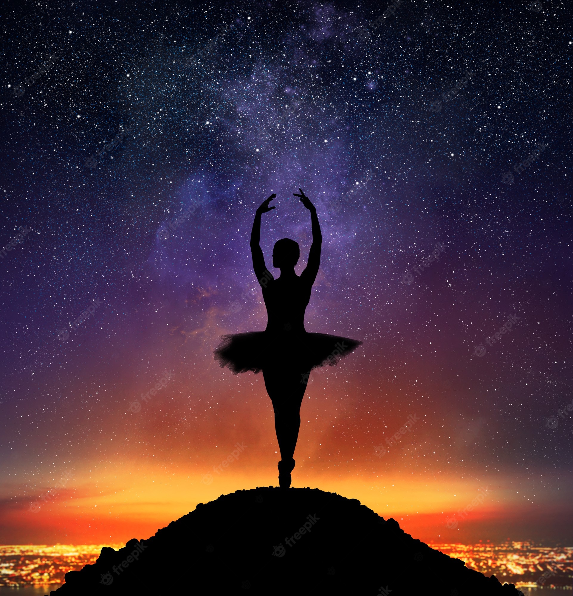 Premium Photo. Dancer in a pose of classical dance on pointe on a mountain