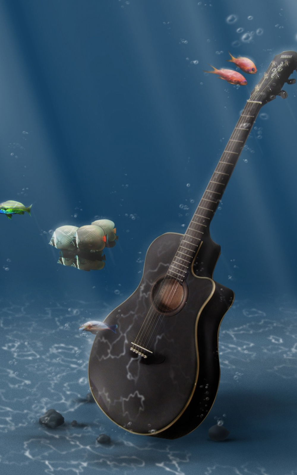A guitar is in the water with fish - Guitar