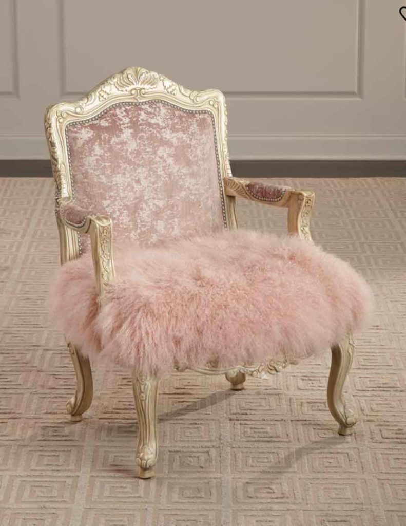 A pink chair with fur on it - Royalcore