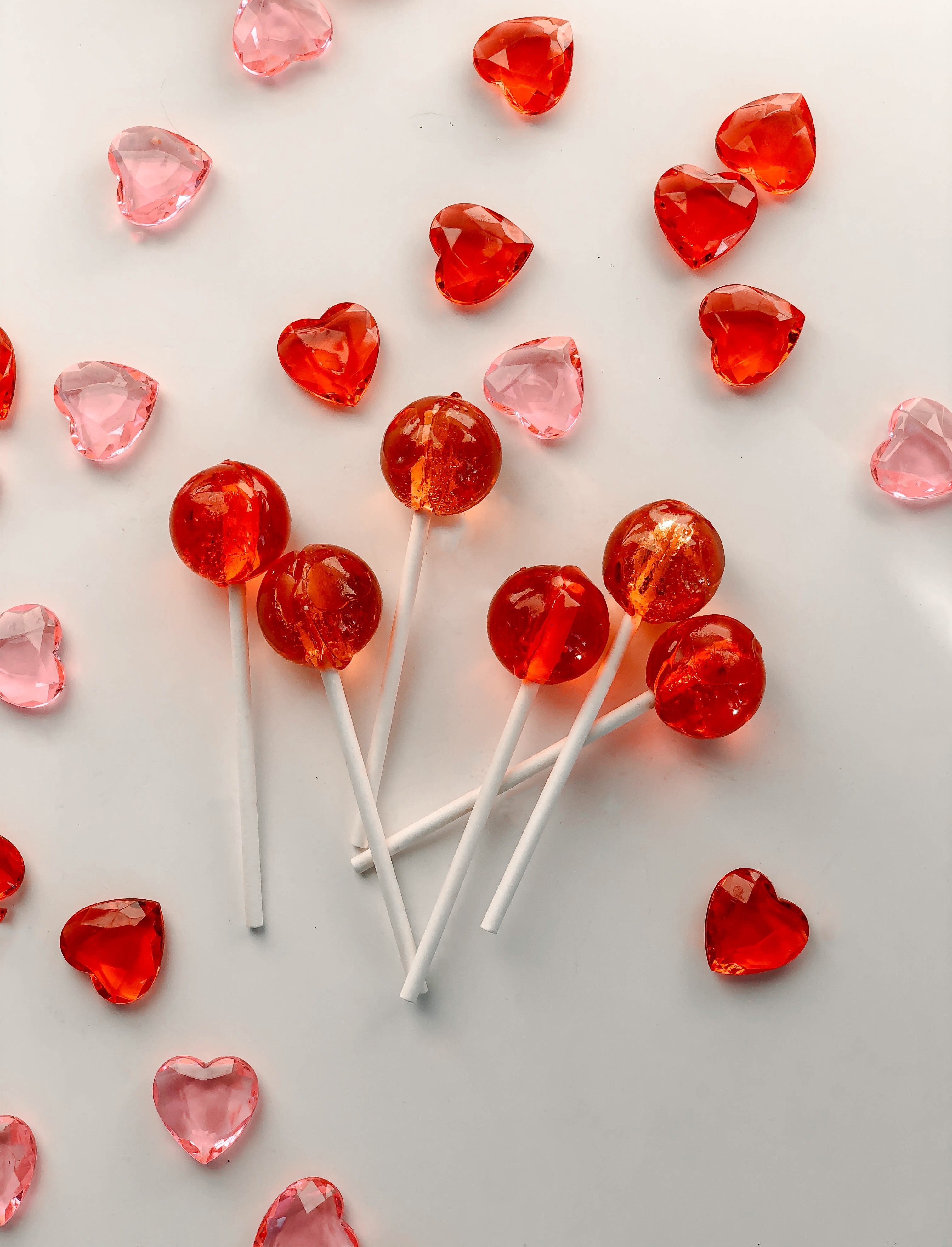 A group of lollipops with hearts on them - Candy