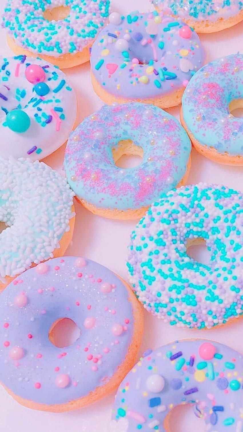 Donuts are a popular sweet treat, and these colorful ones are perfect for a fun and tasty snack. - Bakery