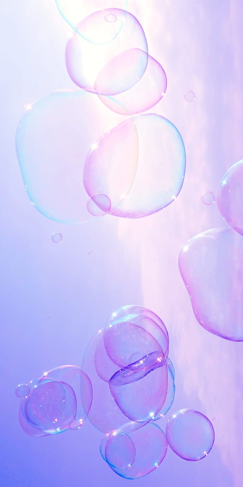 A group of bubbles floating in the air - Bubbles