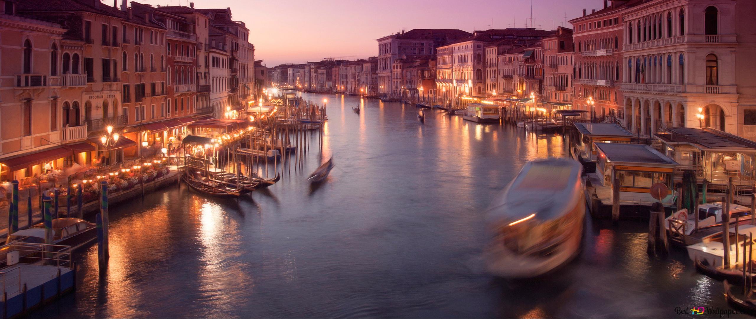 As a row of boats in the water - Italy