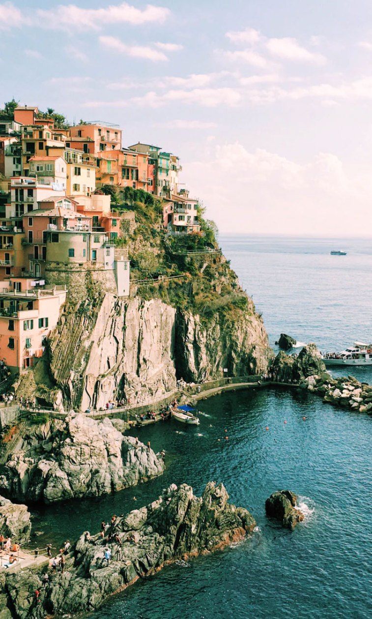 A small town on the side of cliffs - Italy