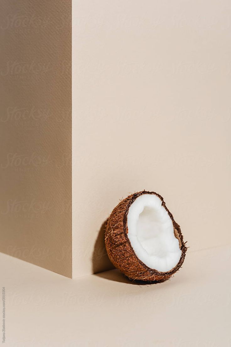 Coconut On Beige» del colaborador de Stocksy «Tatjana Zlatkovic». Coconut, Beauty products photography, Graphic wallpaper