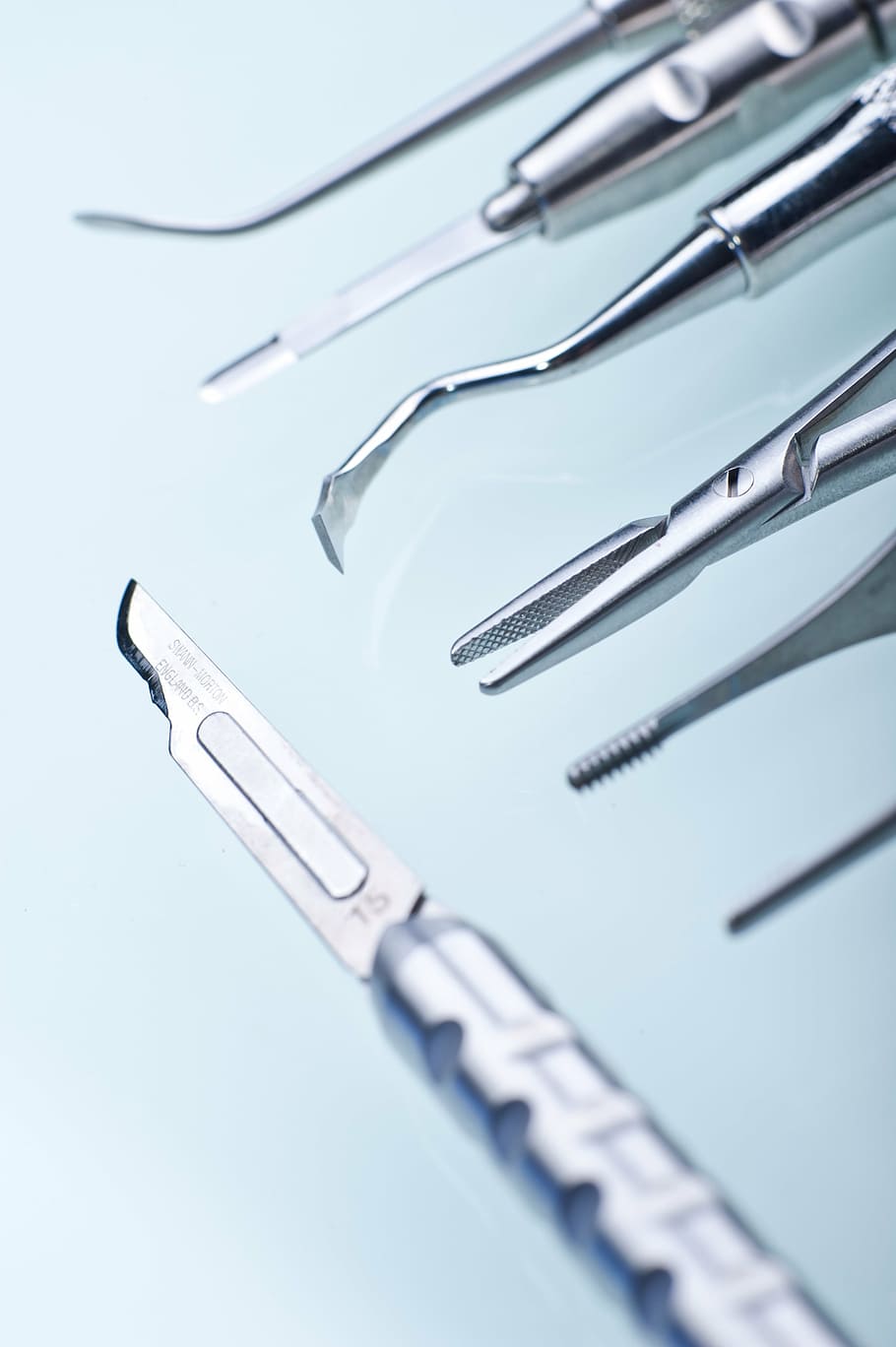 A group of dental instruments on a table - Dentist