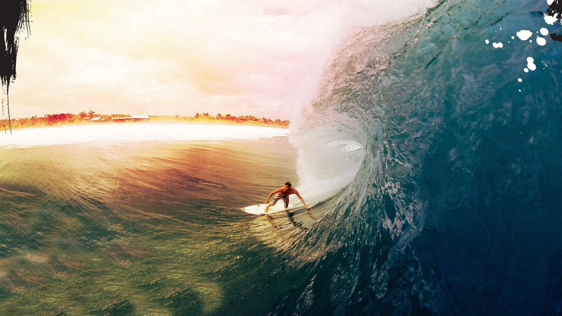 A person riding on top of an ocean wave - Surf