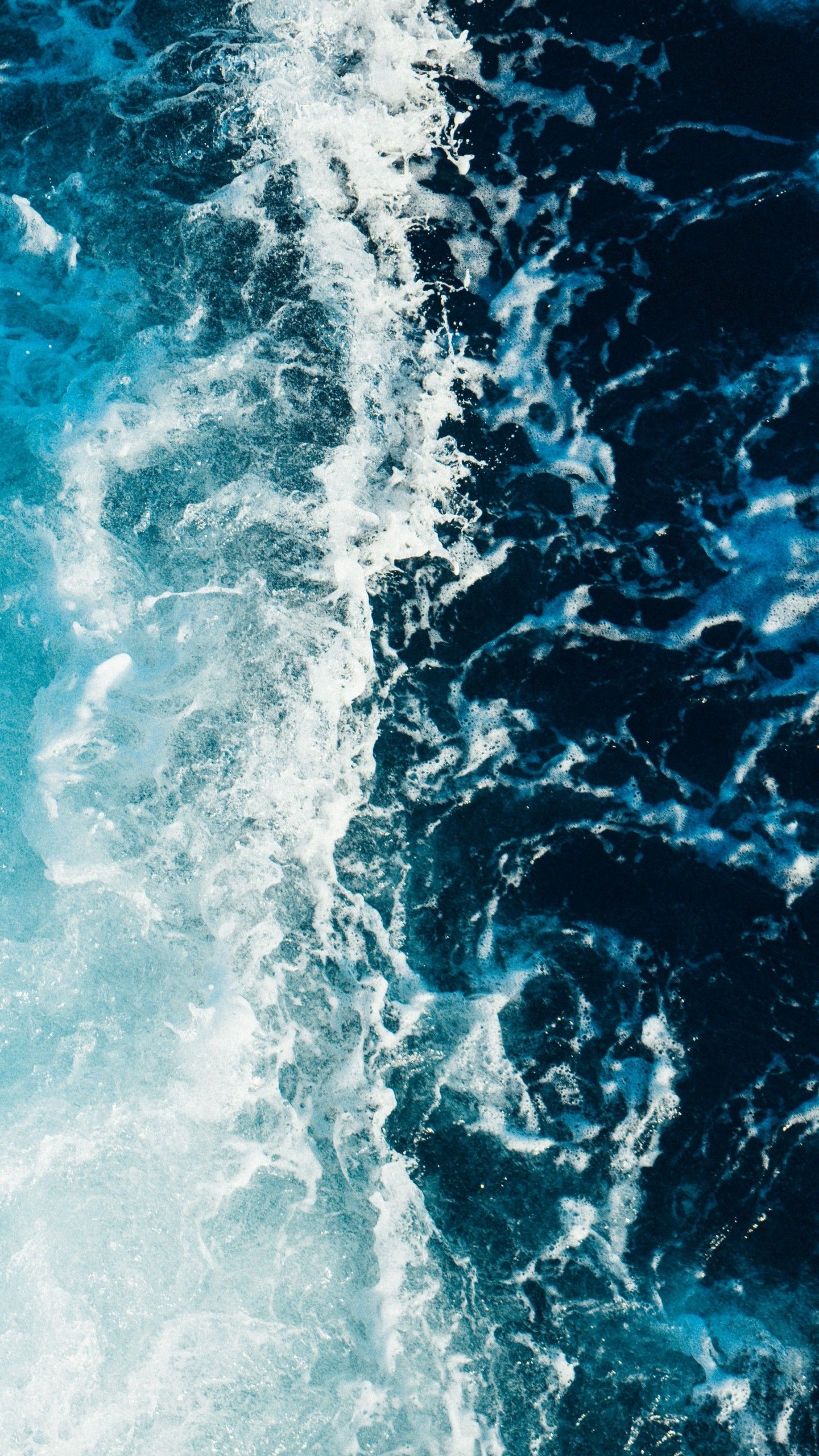 A photo of the ocean waves from above - Surf