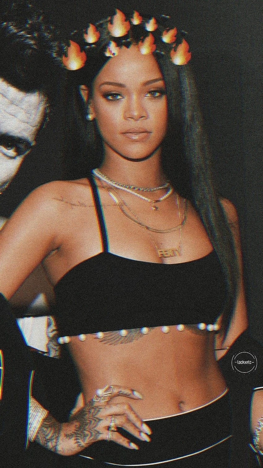 A portrait of Rihanna wearing a black crop top and a fire crown. - Rihanna