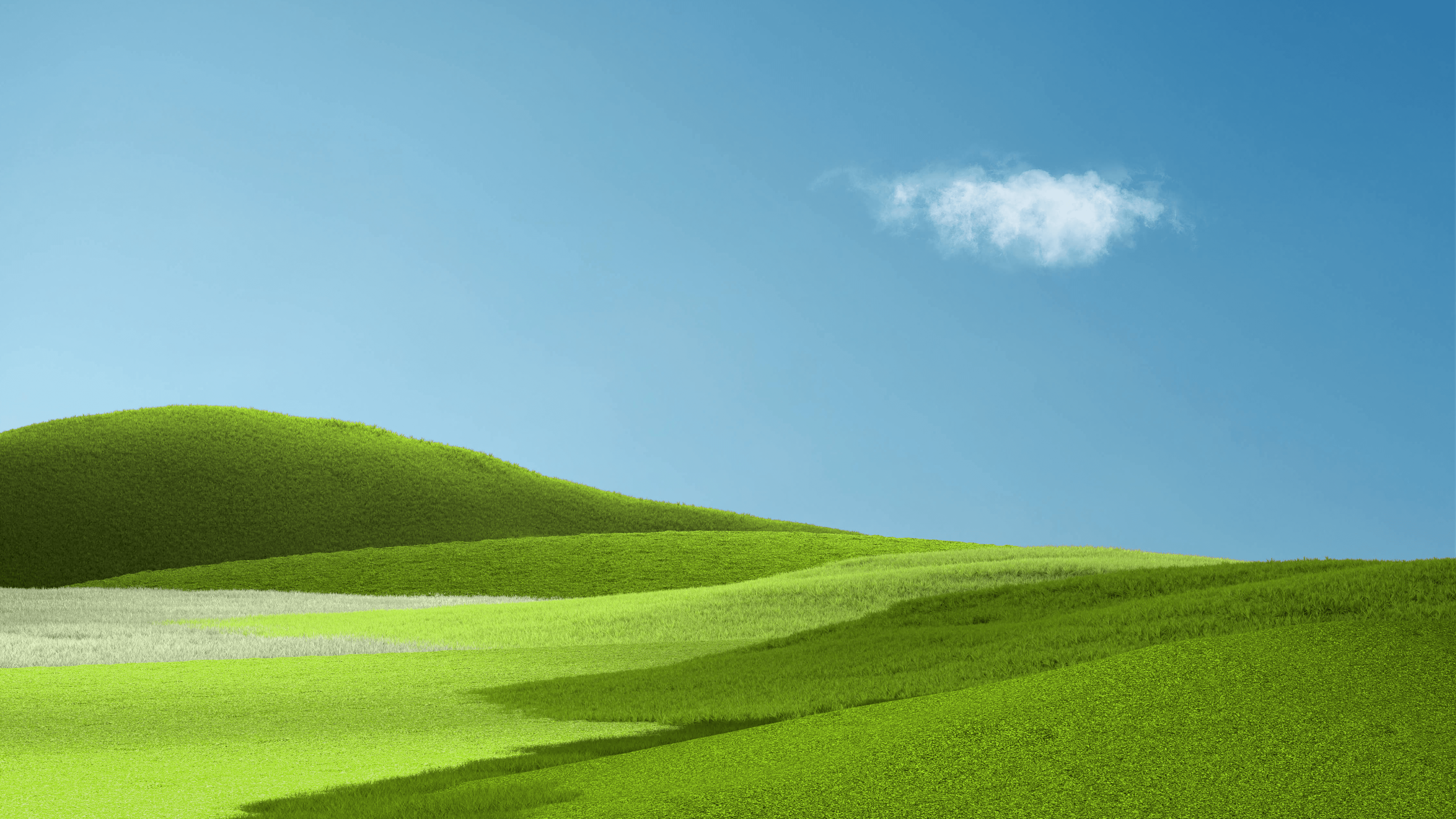 A grassy hill with a single cloud in the sky - Landscape, scenery, nature