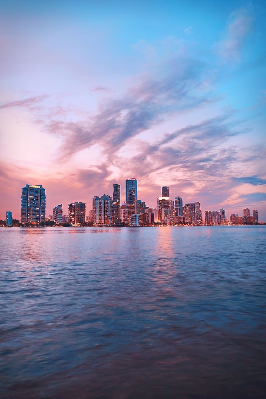 A city skyline at sunset with clouds - Miami, skyline