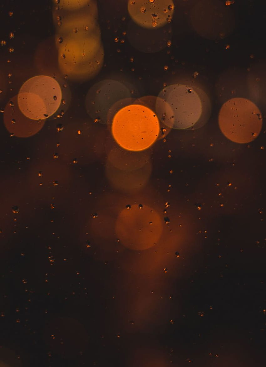 Bokeh lights on a rainy night - Dark orange