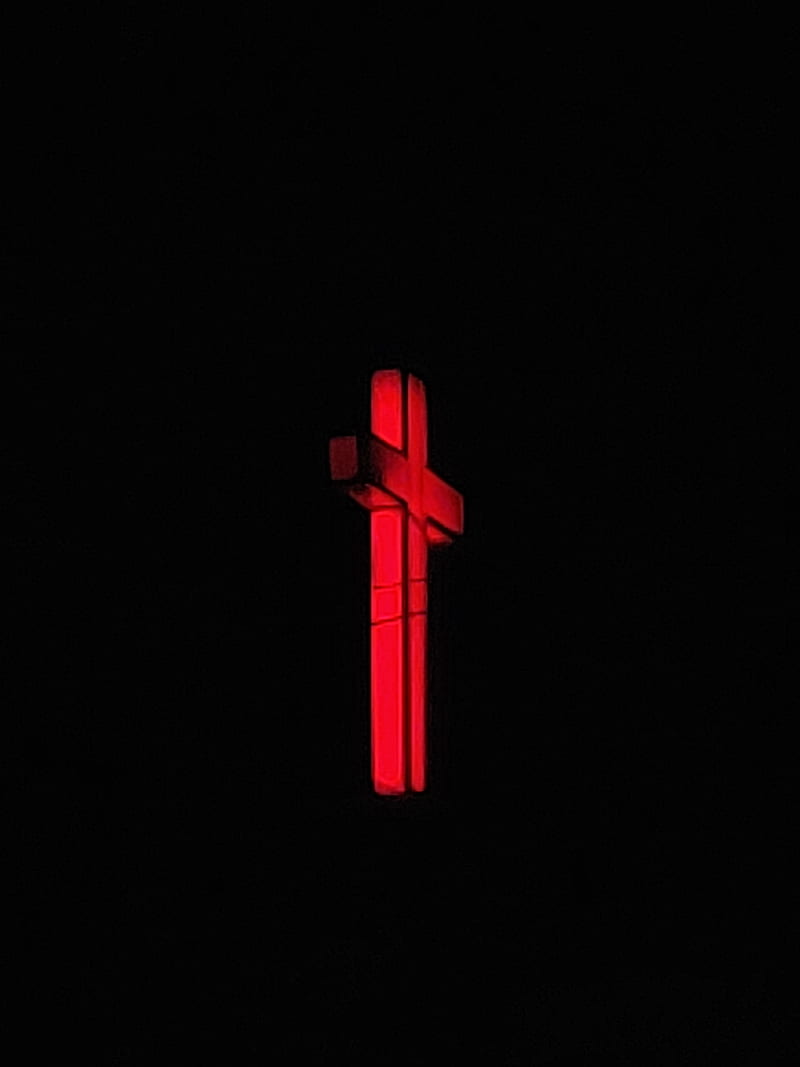 A cross is lit up in the dark - Cross, Jesus