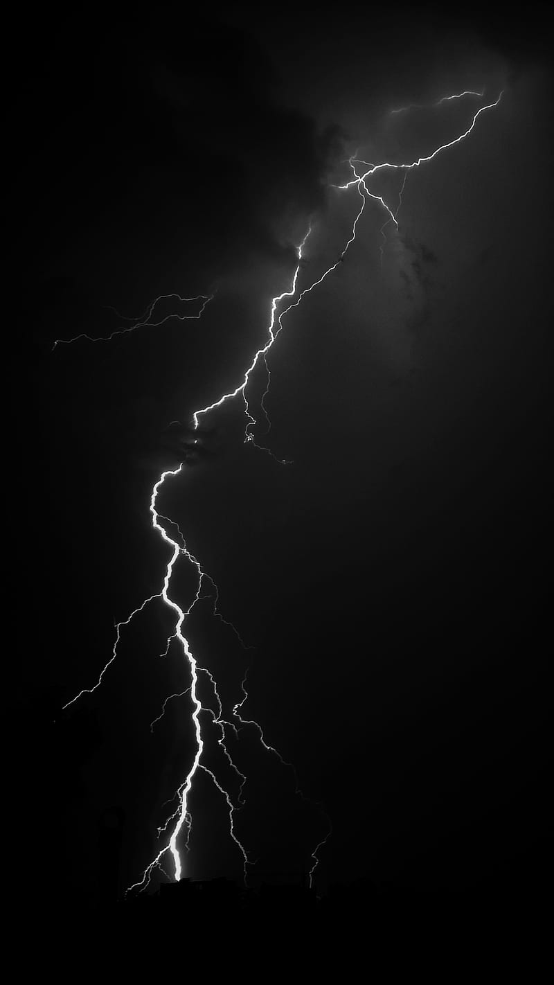 A black and white photo of a lightning bolt - Lightning