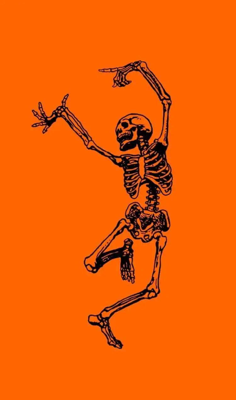 A skeleton dancing on an orange background - Spooky