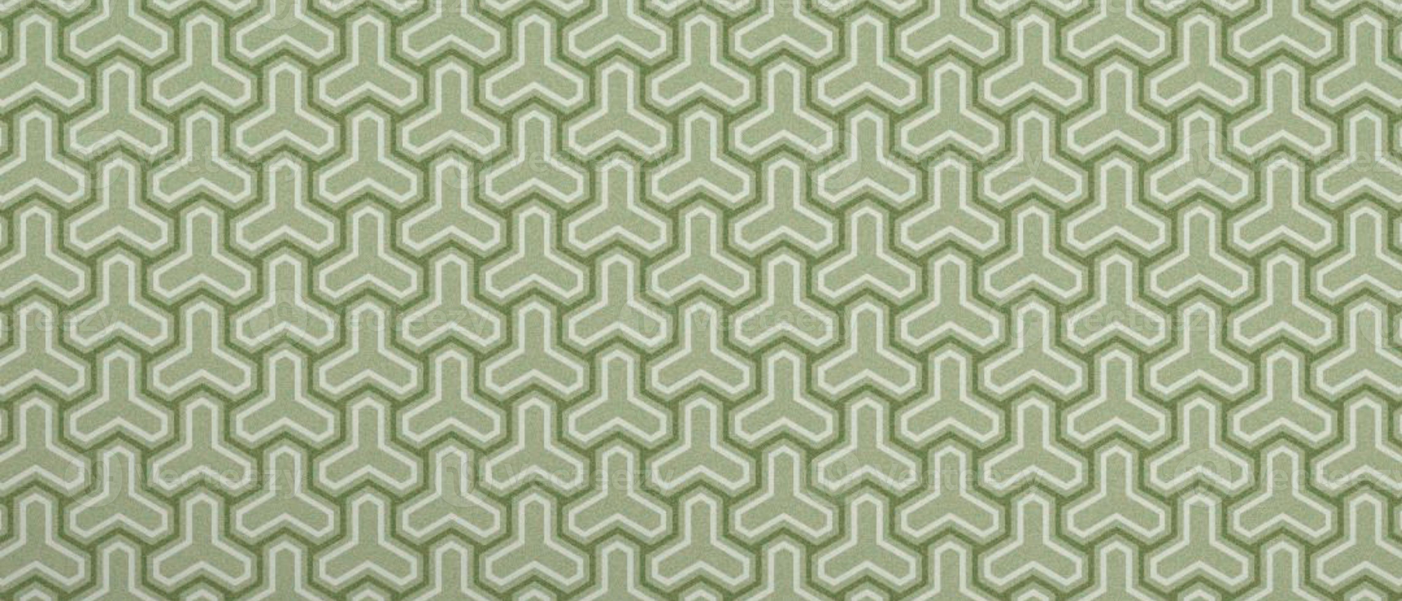 A green and white patterned fabric with geometric shapes - Aqua