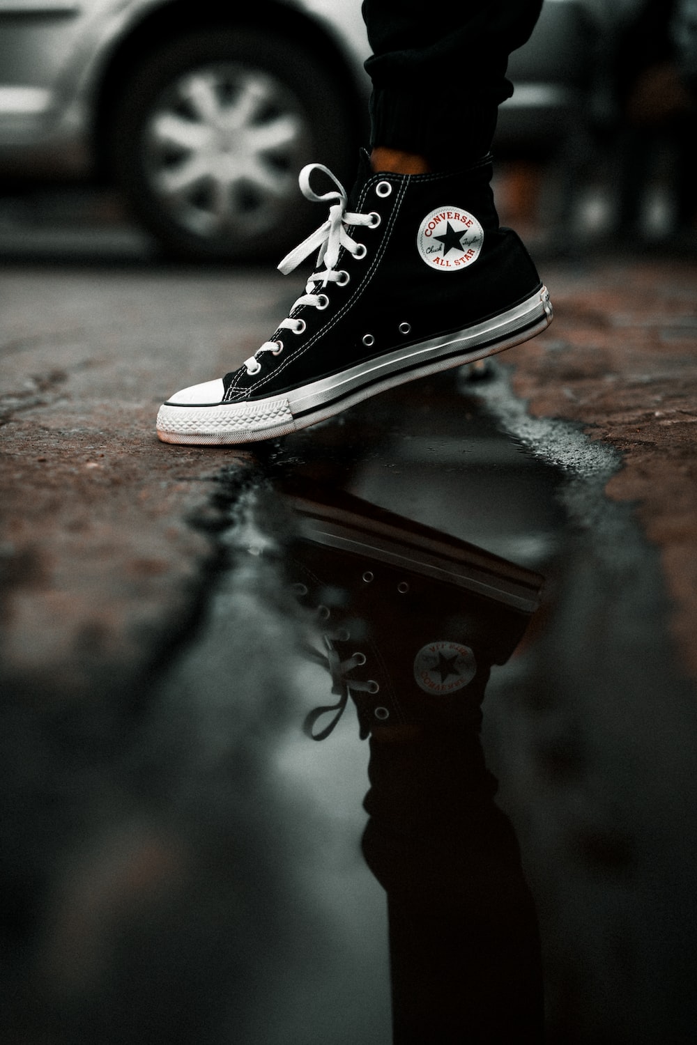 Unpaired Black And White High Top Sneaker Photo