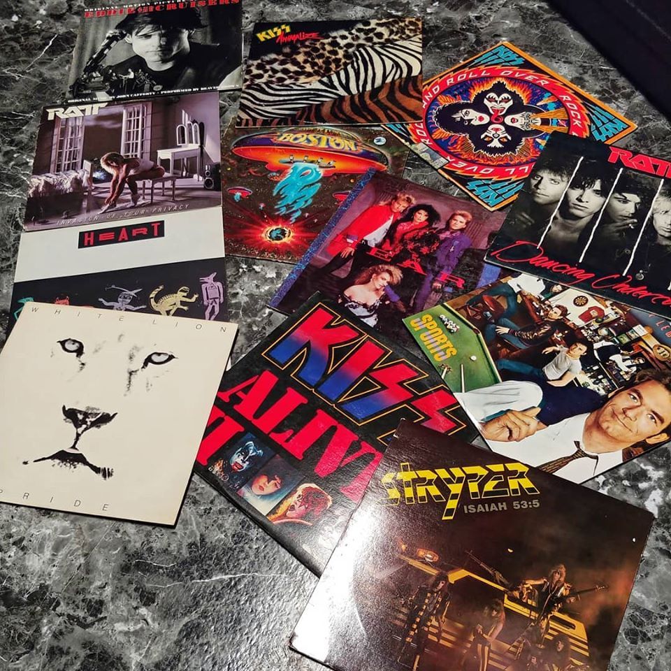A collection of album covers on the table - Rock