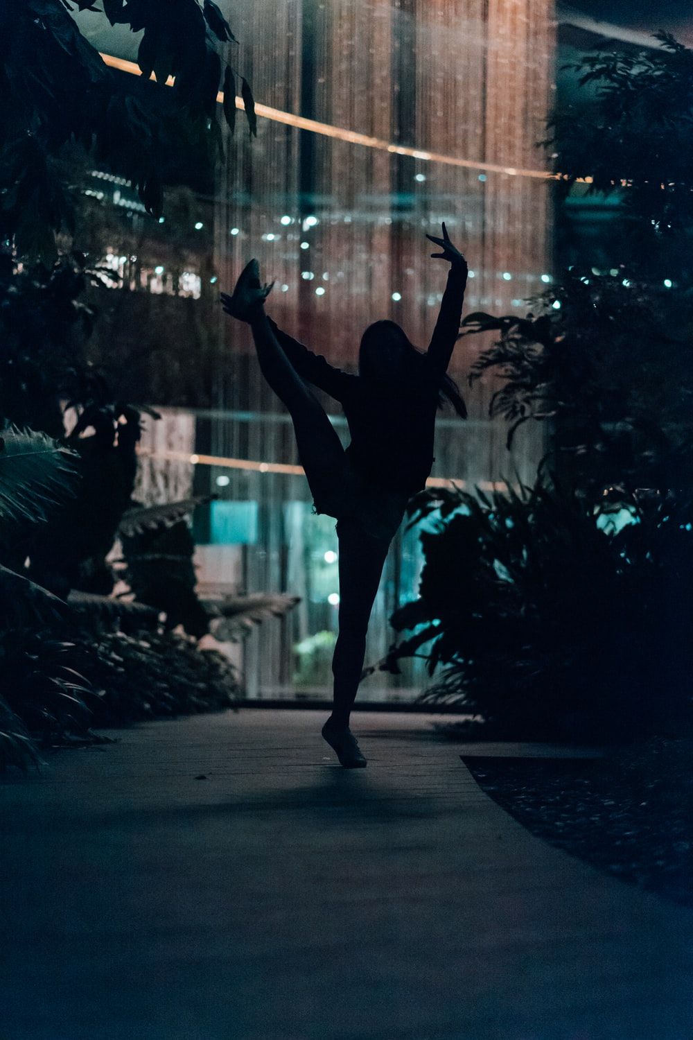 Silhouette of a woman dancing - Dance
