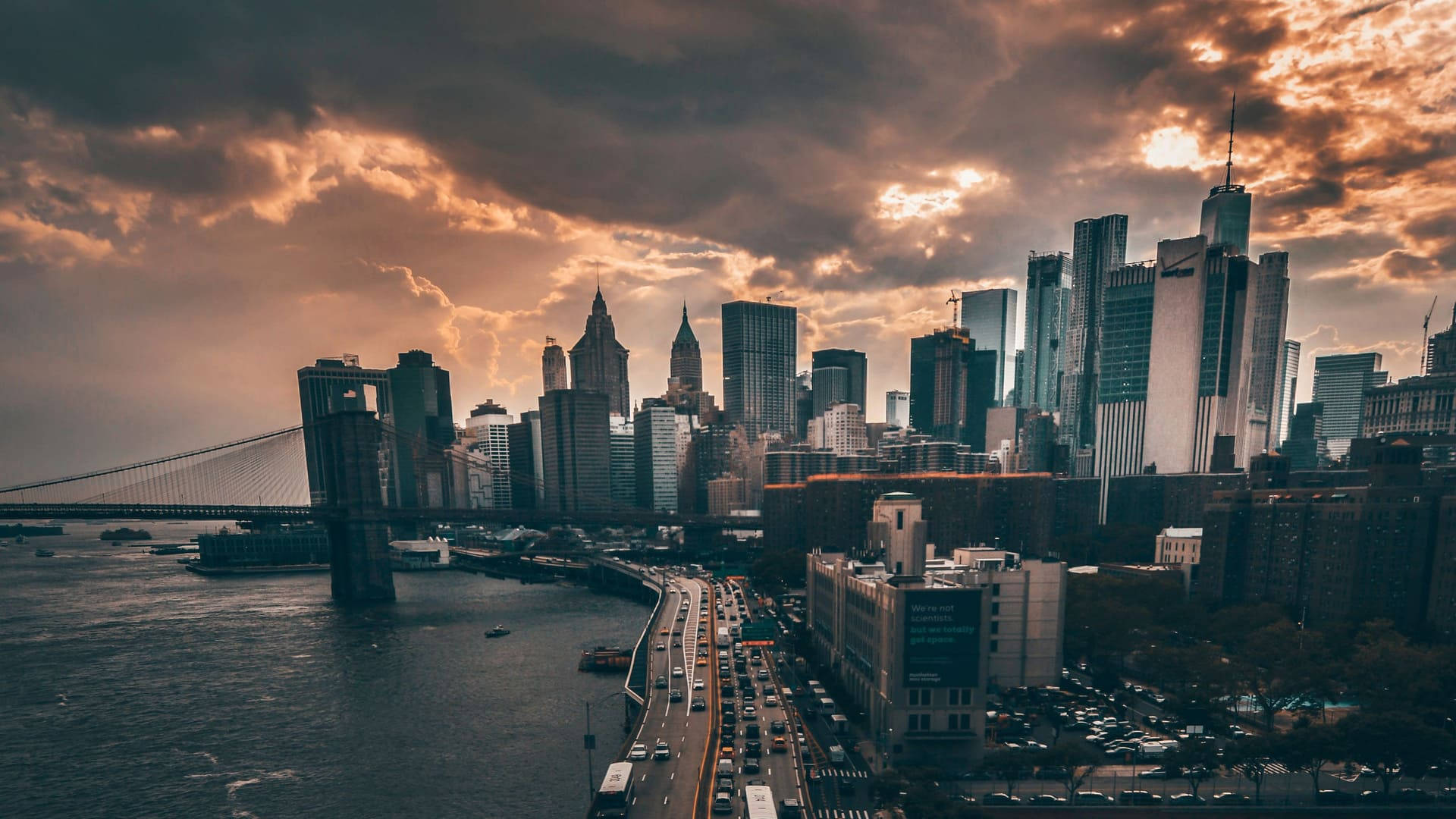 A photo of the city of New York with a cloudy sky - New York